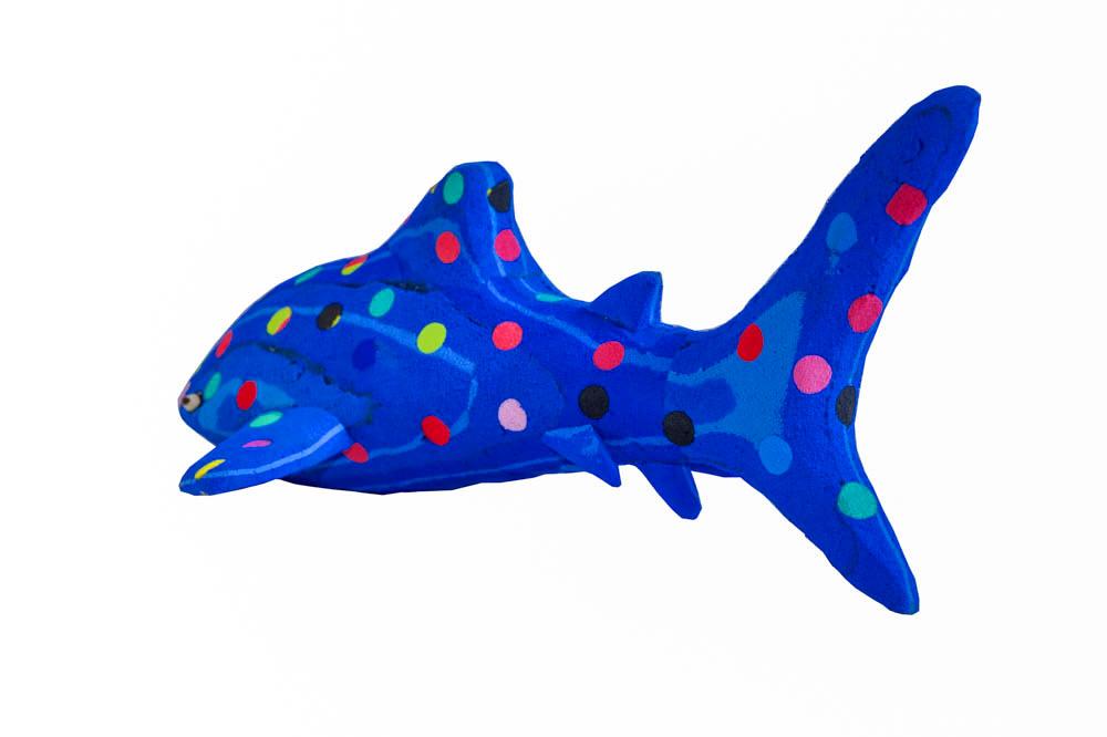 Hand-carved multicolored alligator sculpture made of upcycled flip flops by Ocean Sole.